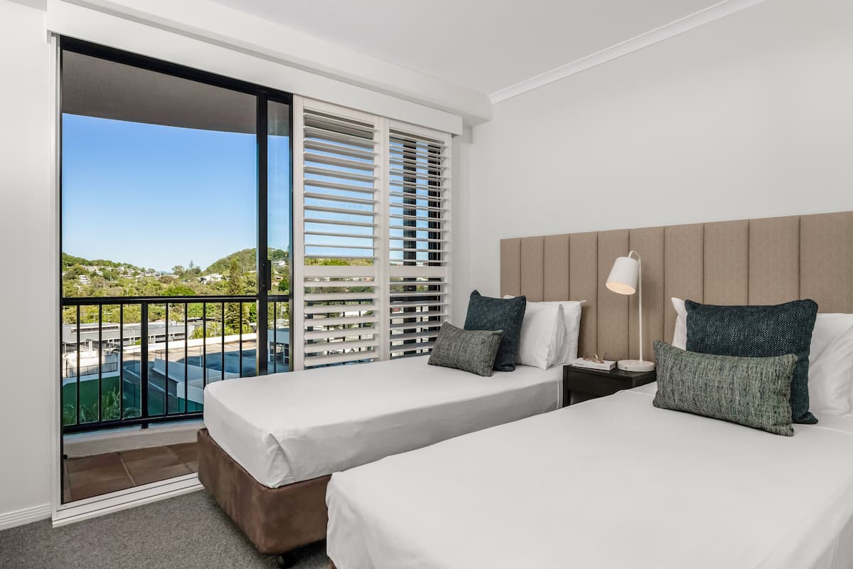 2 bedrooms, in-room safe, soundproofing, iron/ironing board