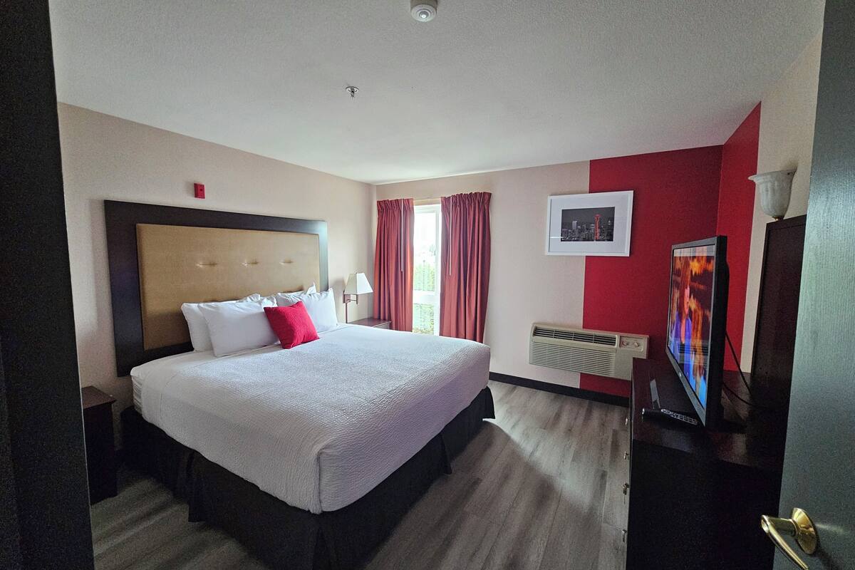 hypo-allergenic bedding, desk, blackout curtains, iron/ironing board