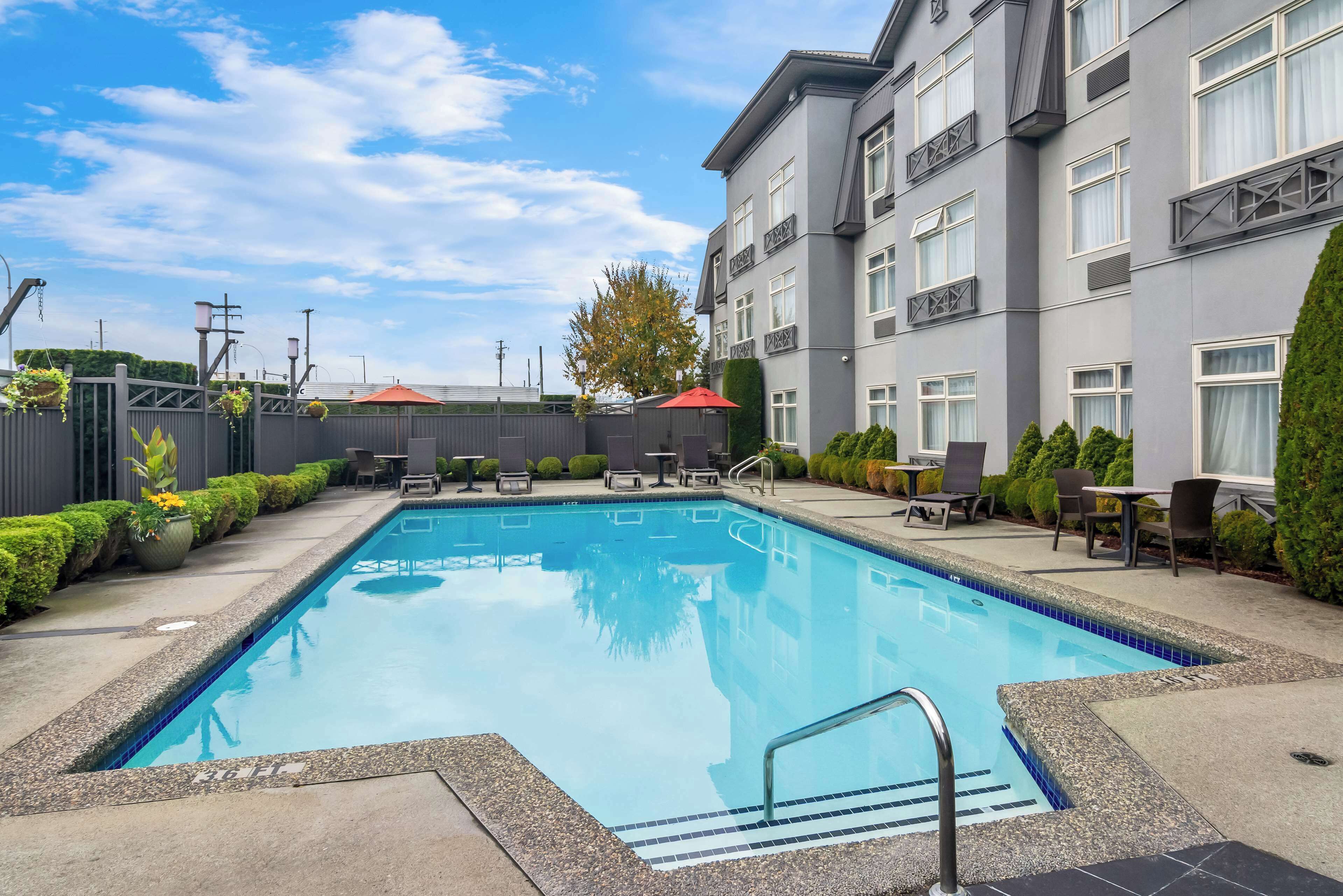 outdoor pool, pool umbrellas, pool loungers