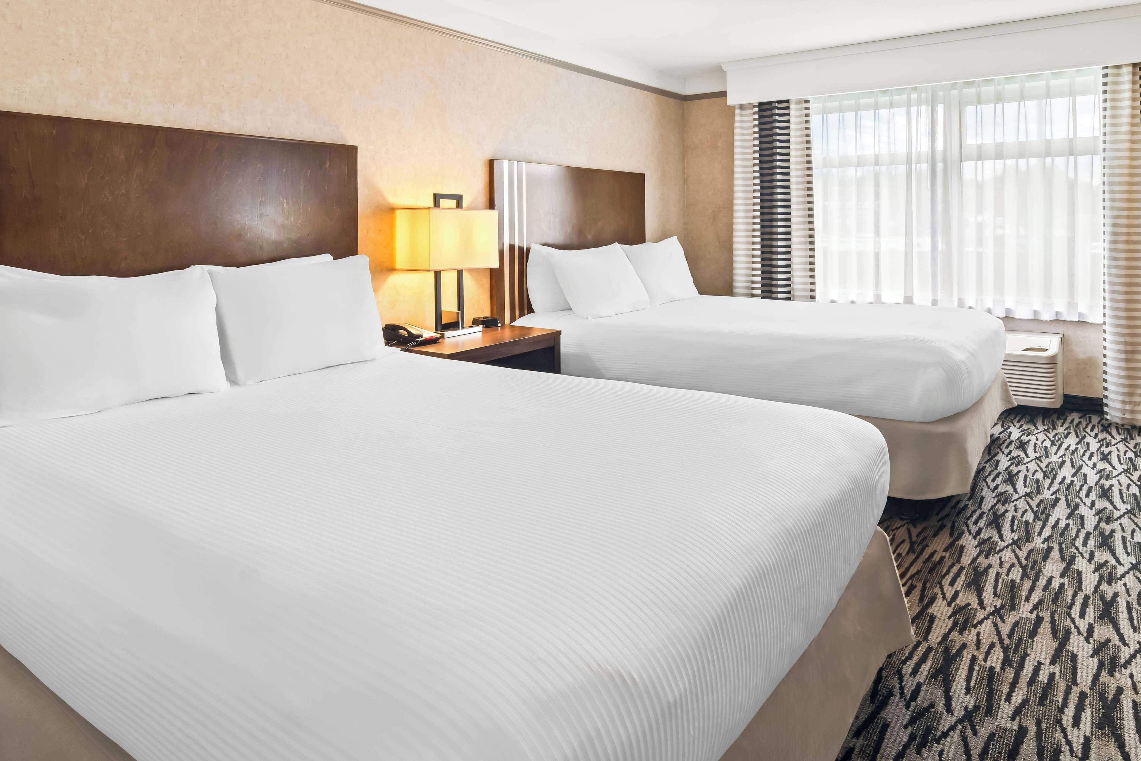 standard room, 2 queen beds, non smoking, refrigerator | 1 bedroom, premium bedding, in-room safe, desk