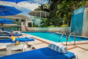 Outdoor pool, pool umbrellas, pool loungers