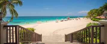On the beach, white sand, beach towels
