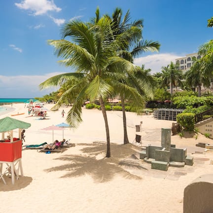 On the beach, white sand, beach towels