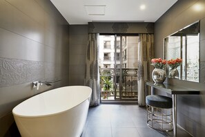 Premium King Suite | Bathroom | Shower, rainfall showerhead, designer toiletries, hair dryer