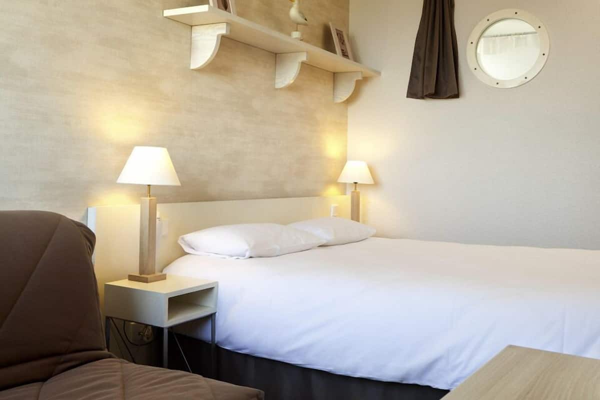 premium bedding, blackout curtains, iron/ironing board