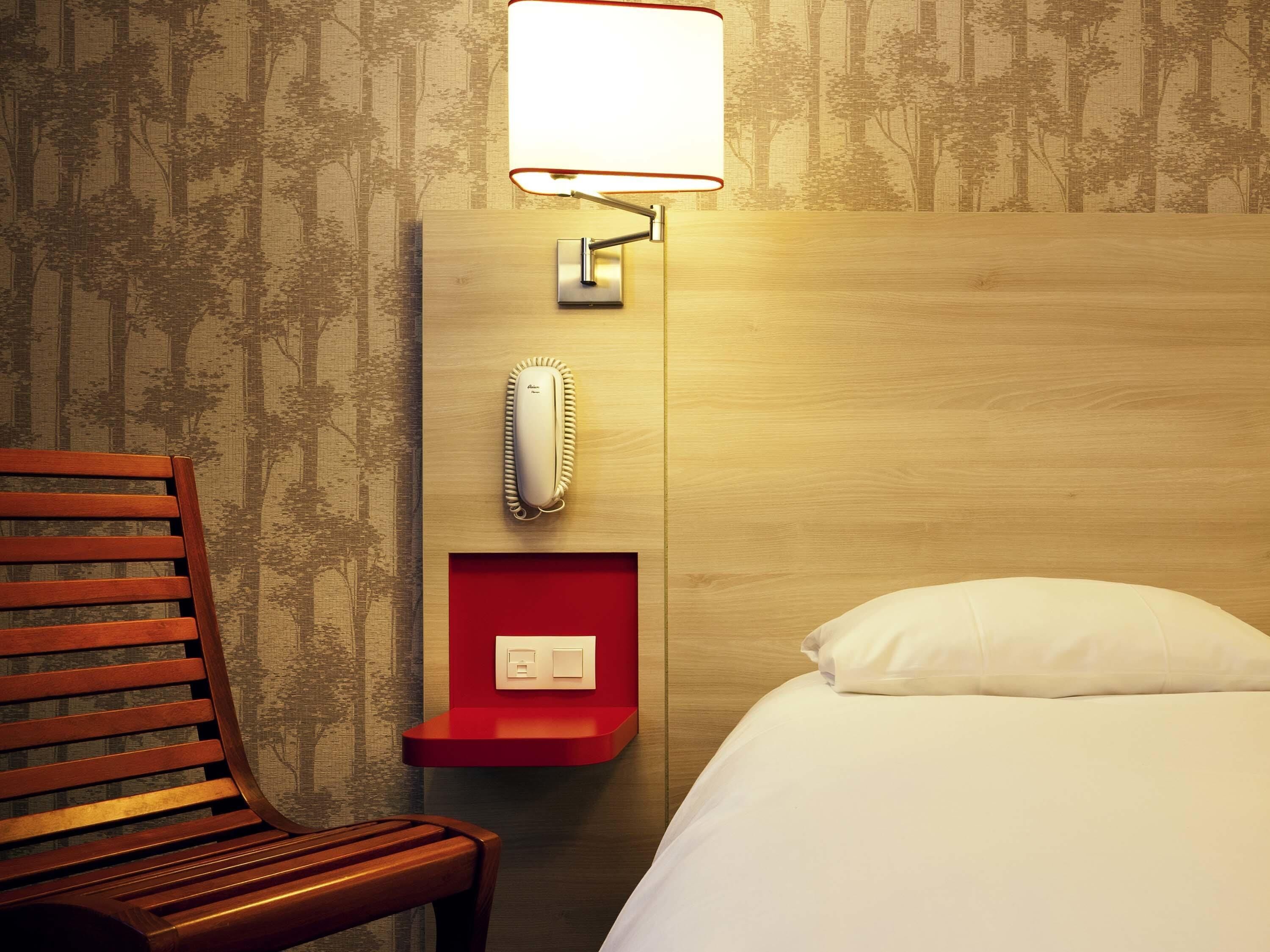 Premium bedding, blackout drapes, iron/ironing board