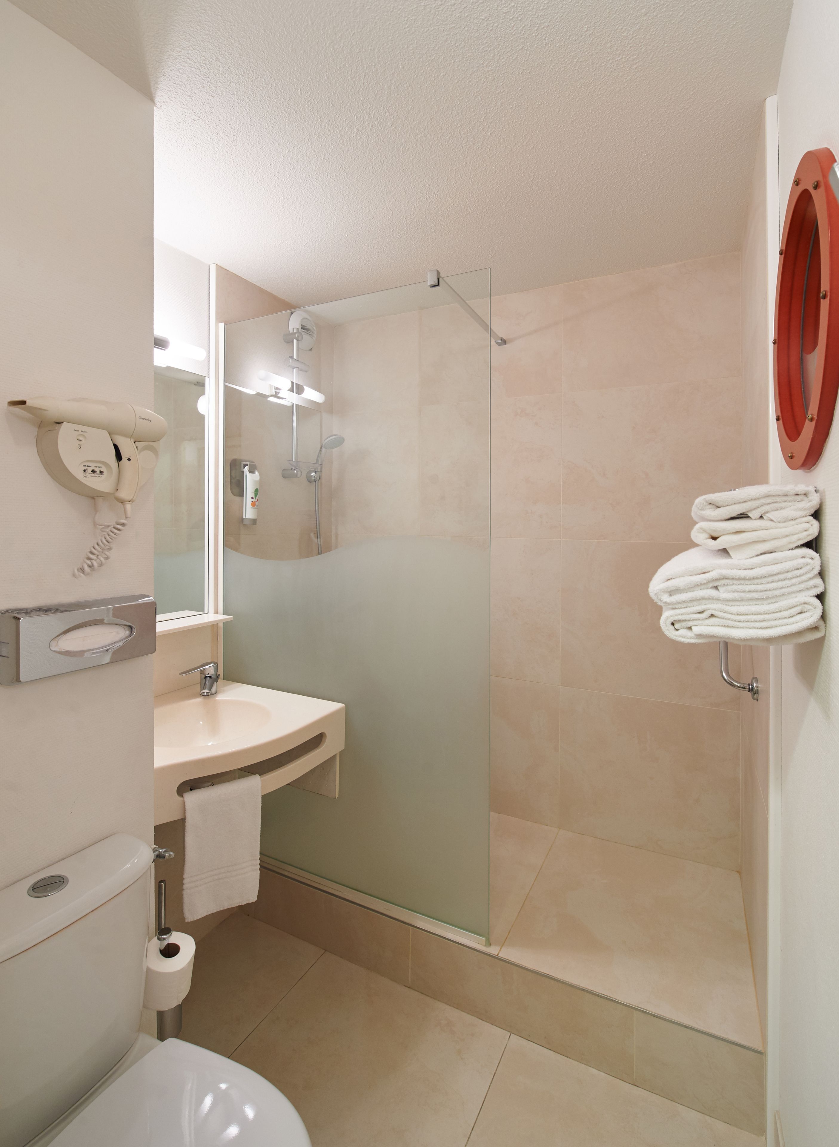 eco-friendly toiletries, hair dryer, towels