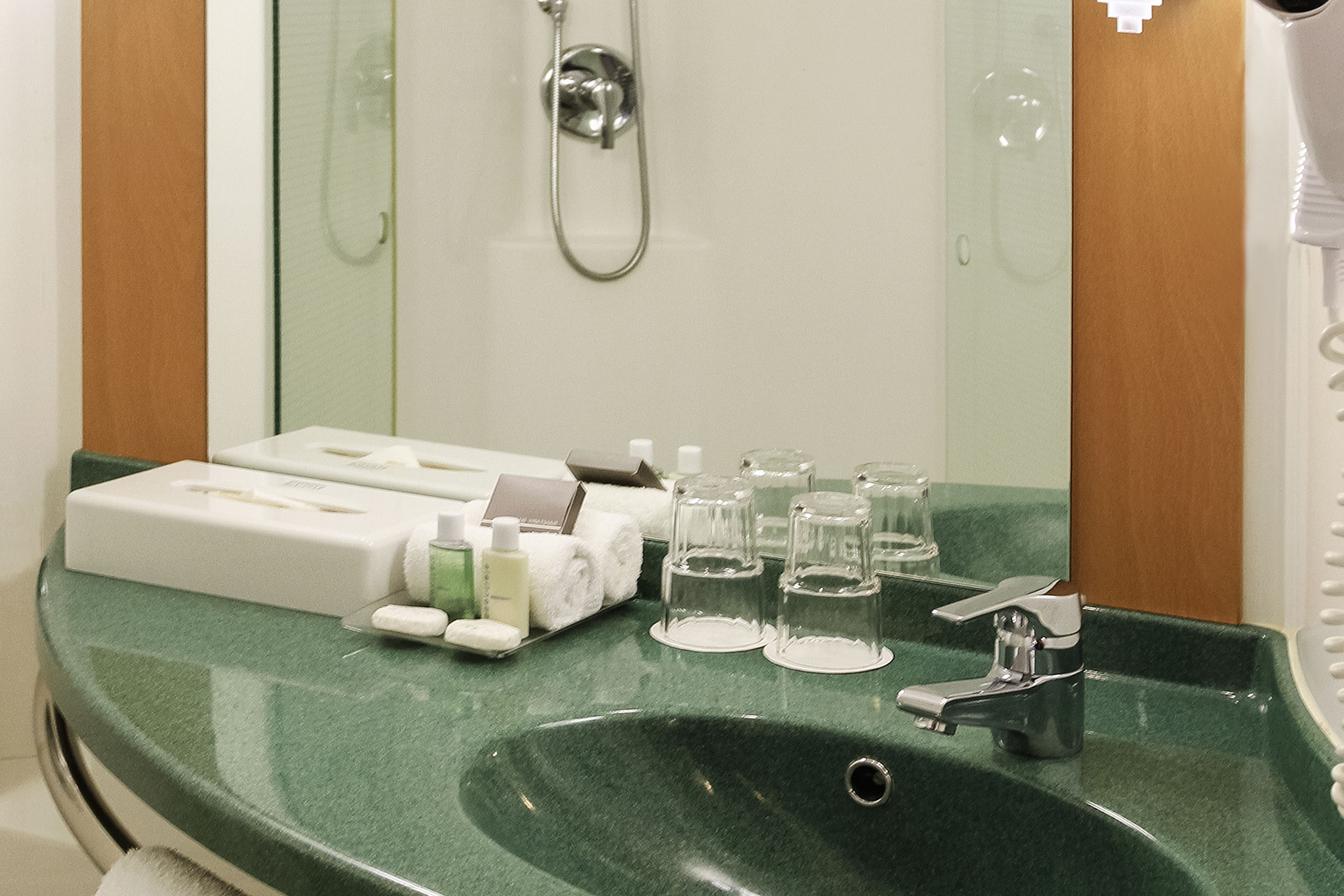 shower, eco-friendly toiletries, hair dryer, towels