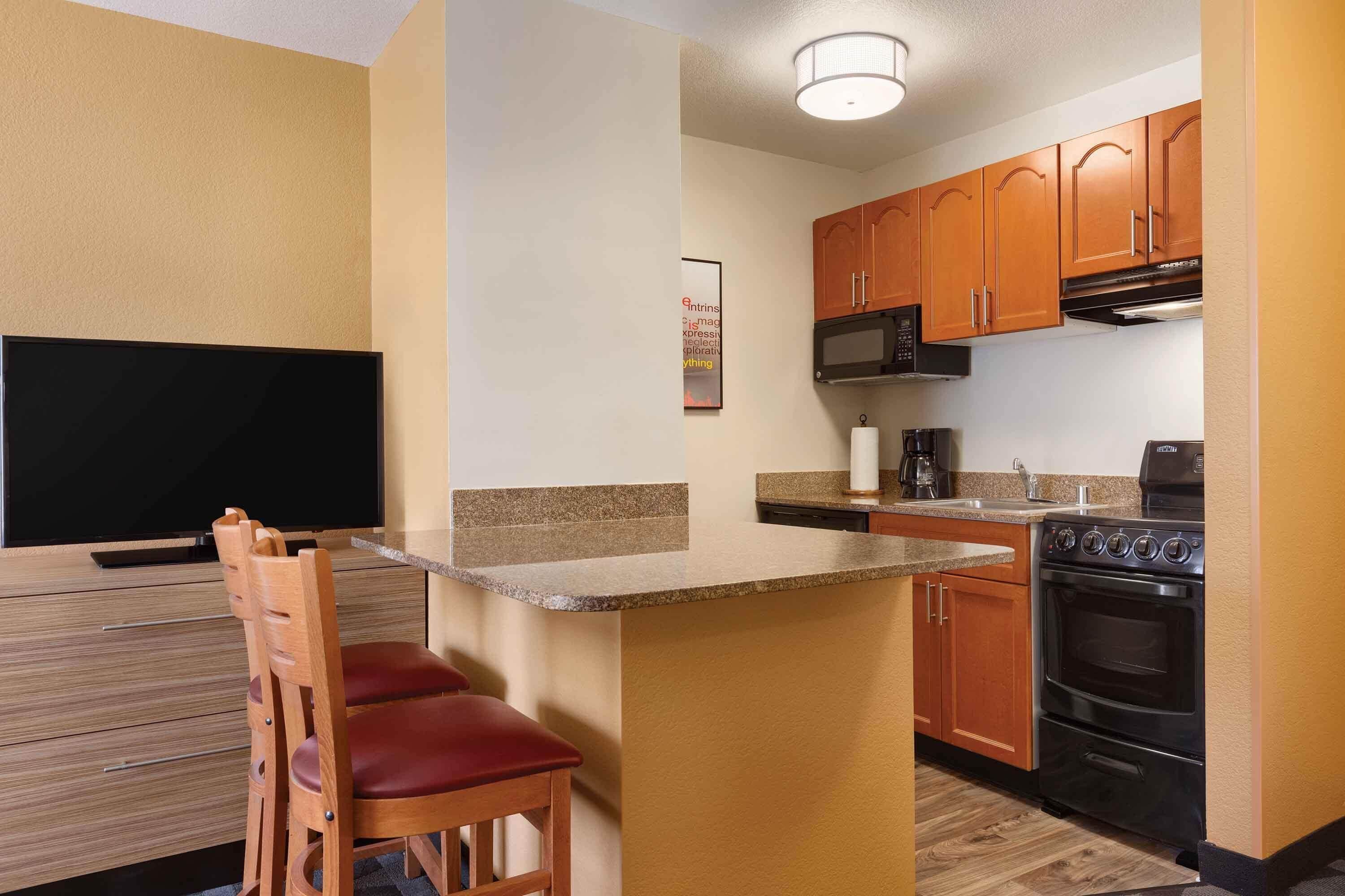 Suite, 2 Queen Beds, Refrigerator & Microwave | Private kitchen