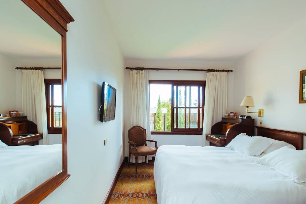 Egyptian cotton sheets, premium bedding, minibar, in-room safe