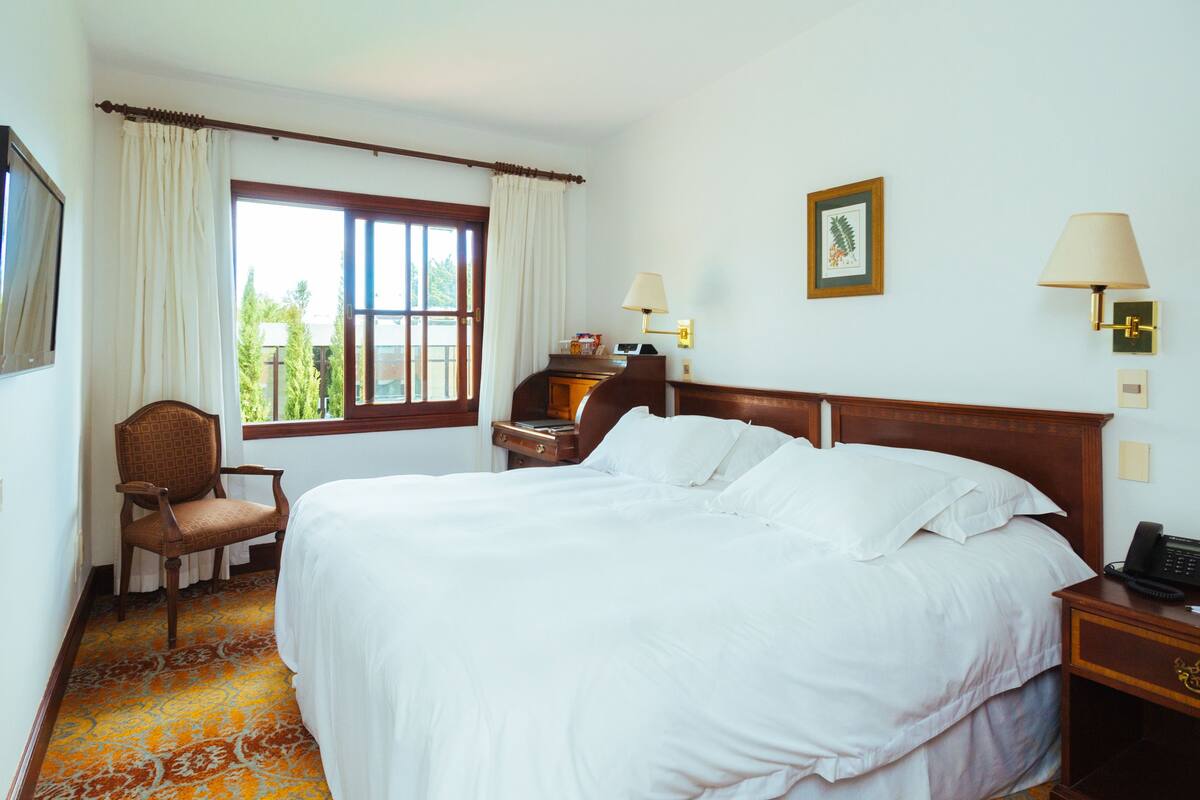 Chambre Standard | Draps en coton égyptien, literie de qualité, minibar