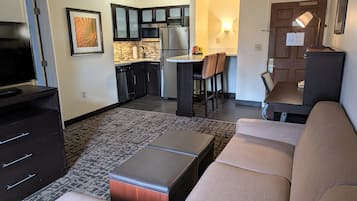 Premium bedding, desk, laptop workspace, blackout curtains