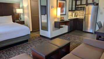 Premium bedding, desk, laptop workspace, blackout curtains