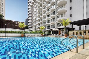 Outdoor pool, open 7:00 AM to 10:00 PM, pool umbrellas, pool loungers