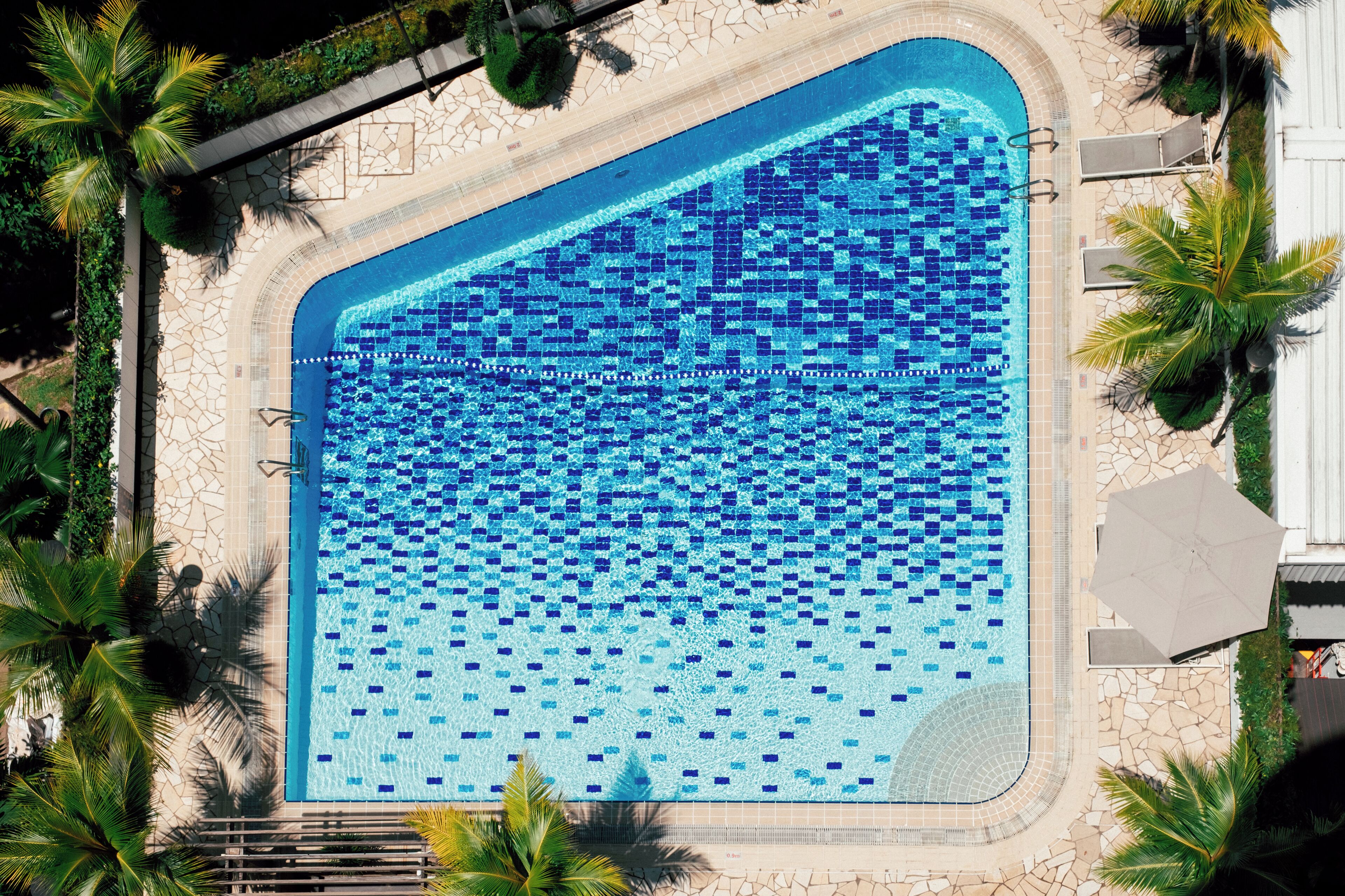 Outdoor pool, open 7:00 AM to 10:00 PM, pool umbrellas, sun loungers