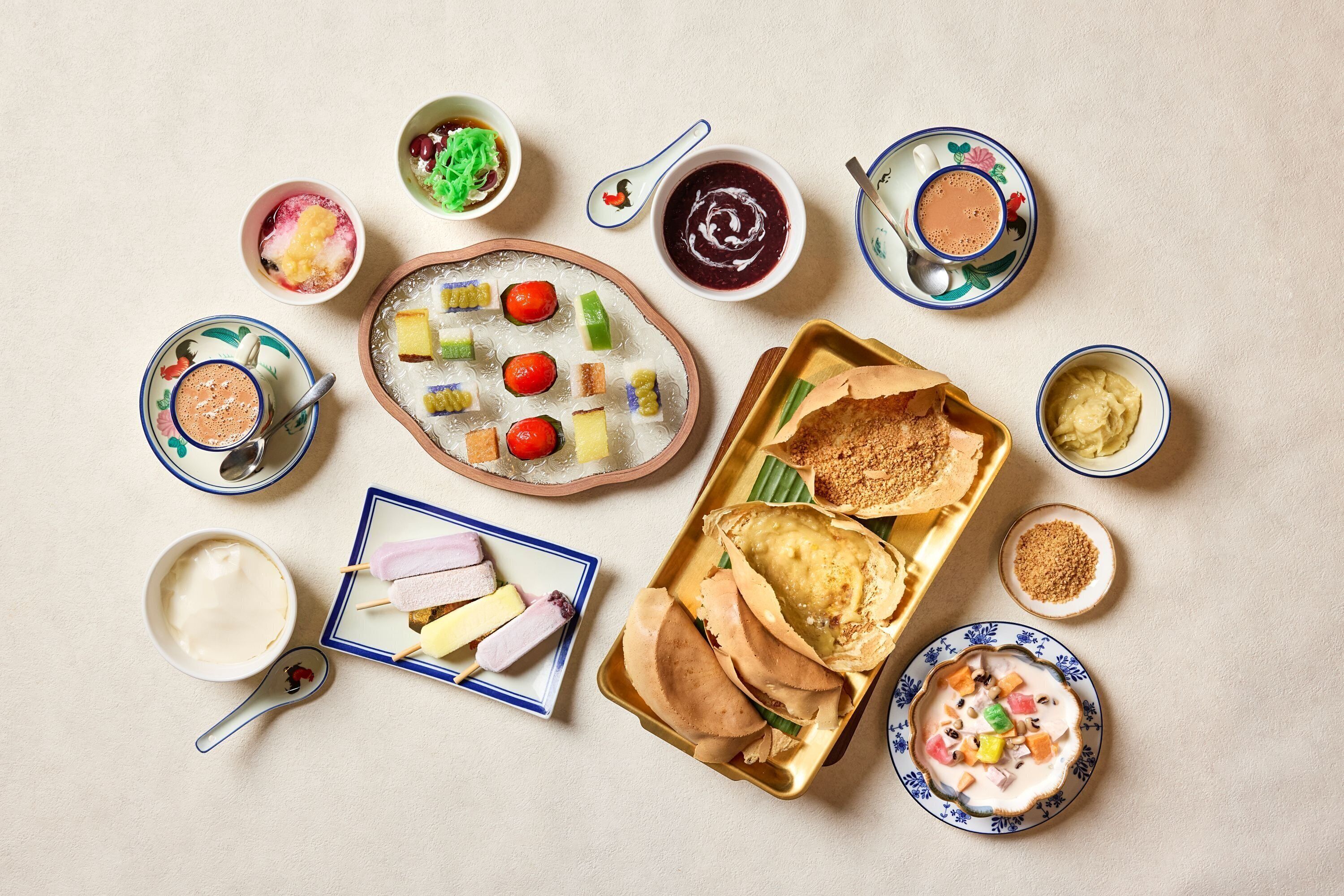 A variety of food items and dishes arranged on a table.