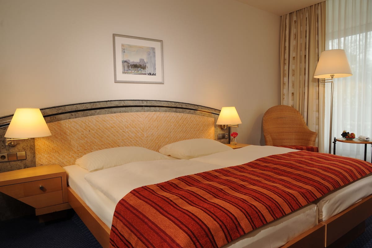 Premium bedding, pillow-top beds, in-room safe, desk