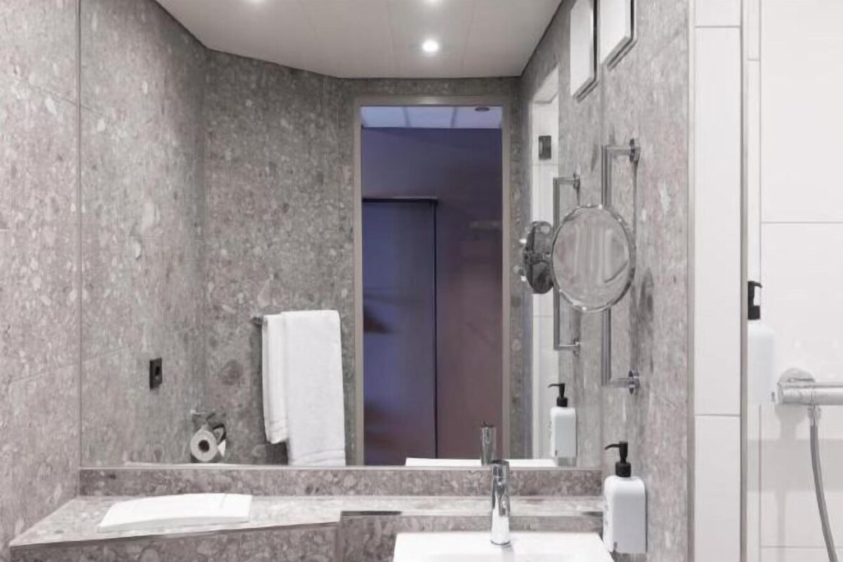 Shower, rainfall showerhead, eco-friendly toiletries, hair dryer