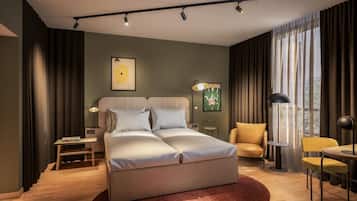 Hypo-allergenic bedding, in-room safe, desk, laptop workspace