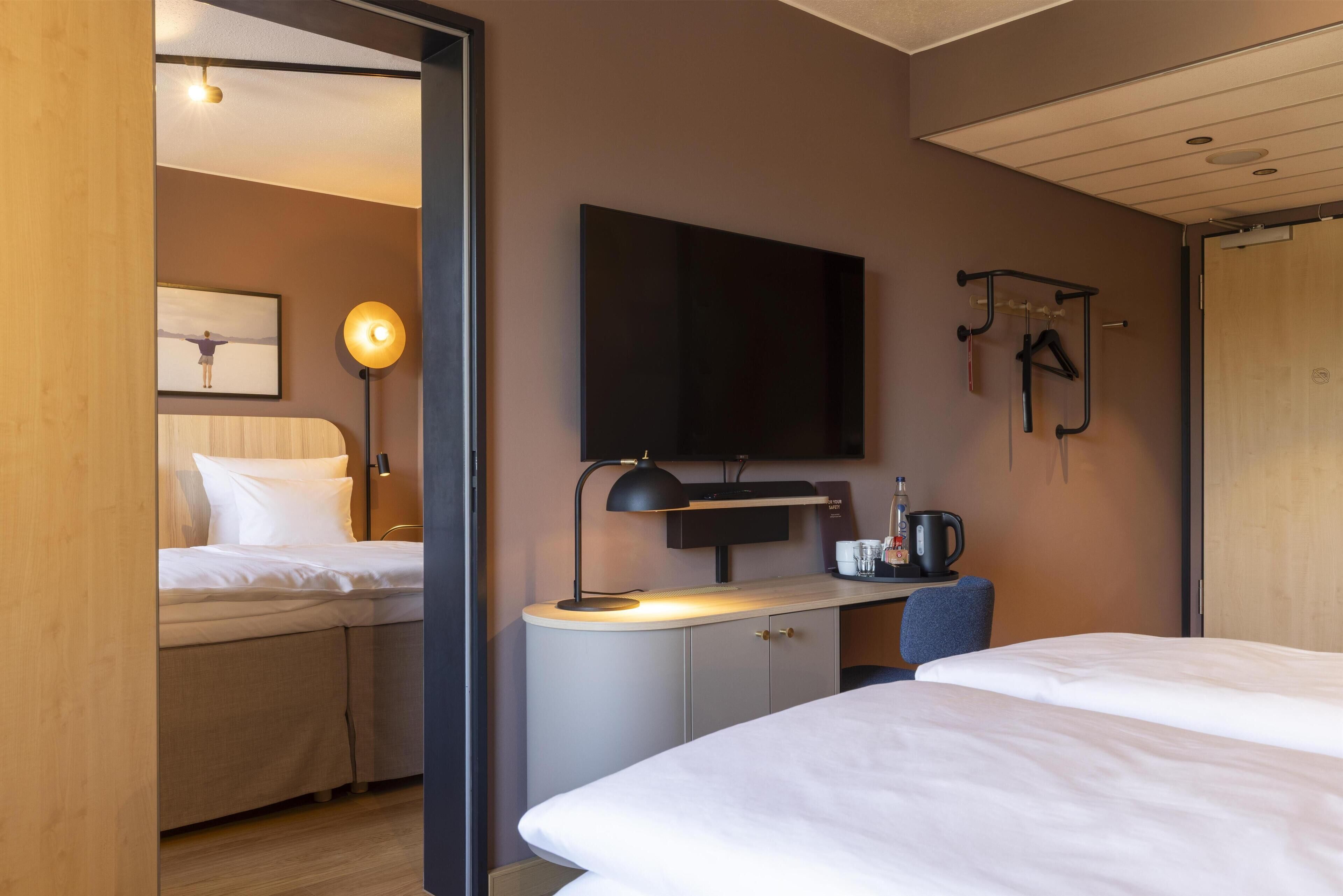 Family Room (Three) | Hypo-allergenic bedding, in-room safe, desk, laptop workspace