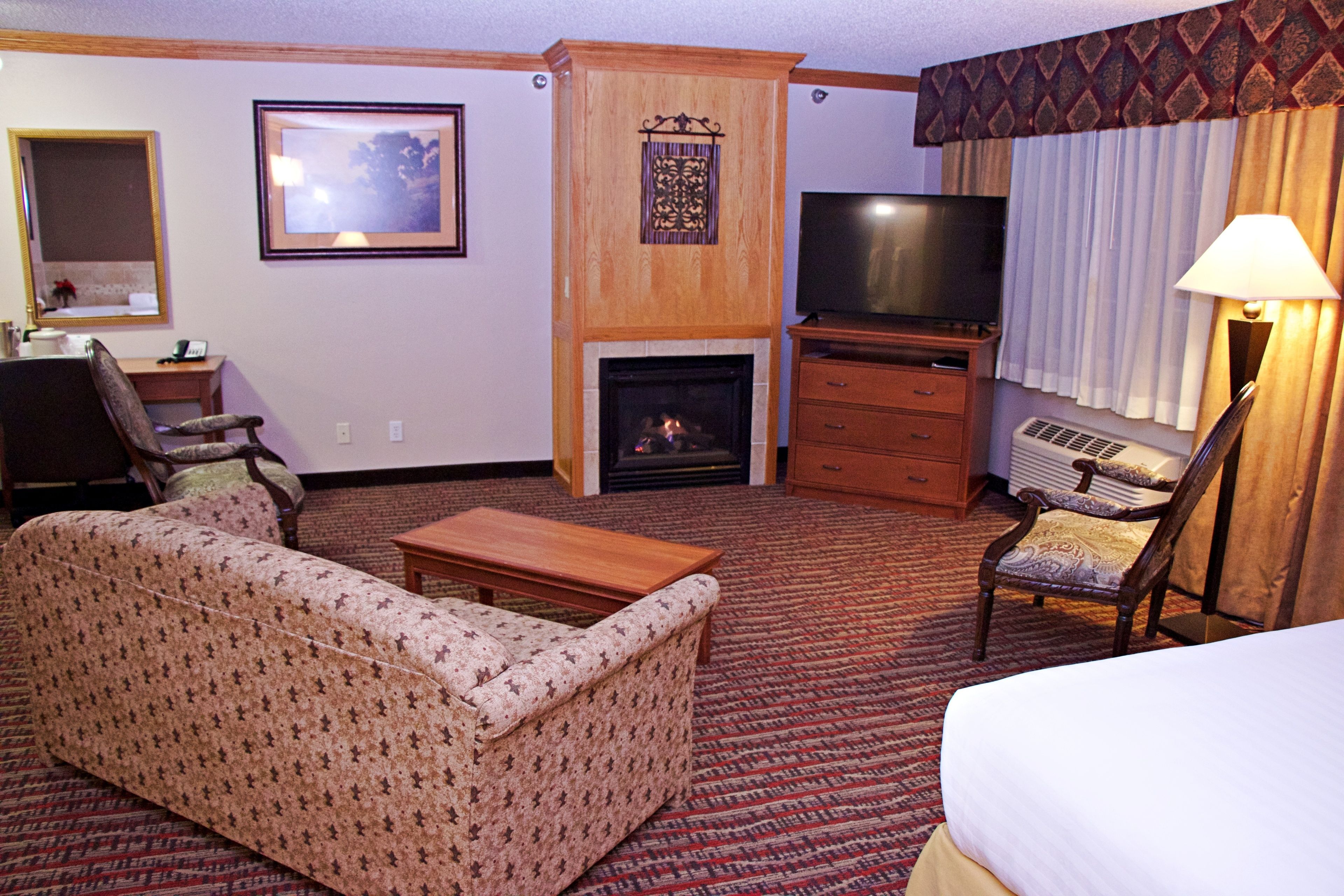 suite, multiple beds | in-room safe, individually decorated, desk, laptop workspace