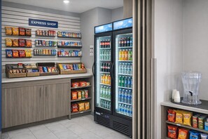 A grocery store with an express shop, snack aisles, and refrigerated beverages. - Holiday Inn Express & Suites Fort Pierre by IHG (Fort Pierre)