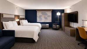 A hotel room with two beds, a desk, a chair, a TV, and a lamp. - Holiday Inn Express & Suites Fort Pierre by IHG (Fort Pierre)
