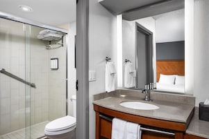 Designer toiletries, hair dryer, towels, soap