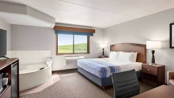 Deluxe Studio Suite, 1 King Bed, Non Smoking | In-room safe, desk, blackout drapes, soundproofing