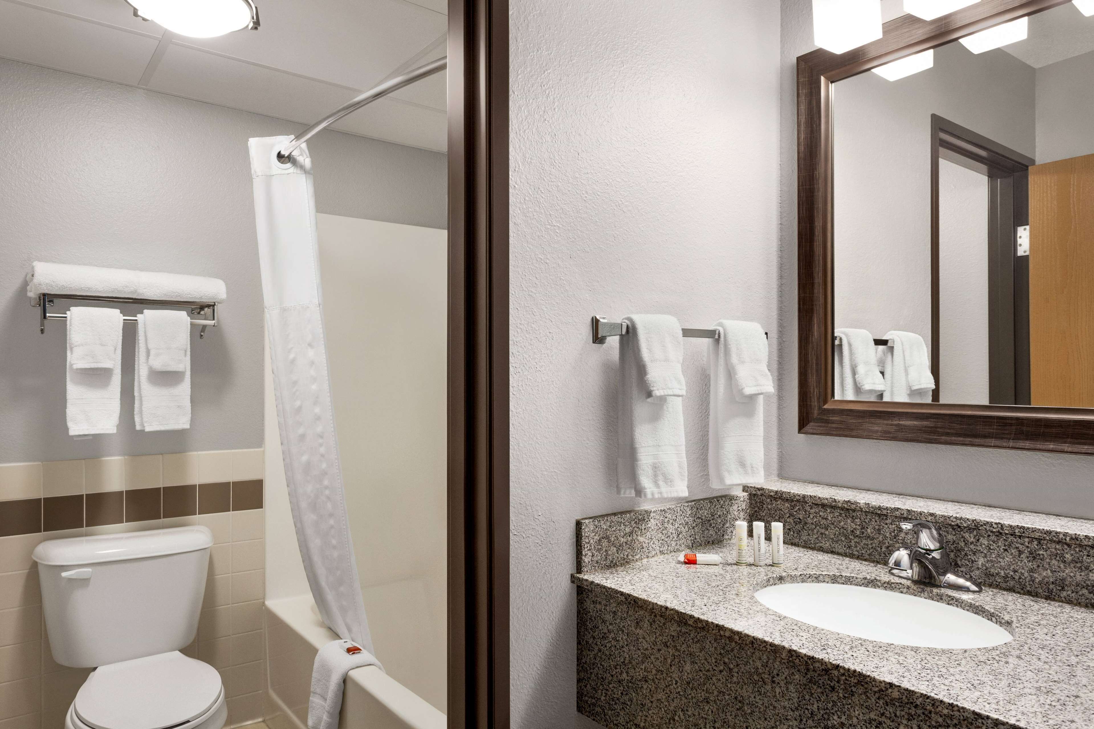 room, 2 queen beds, non smoking | bathroom | free toiletries, hair dryer, bathrobes, towels