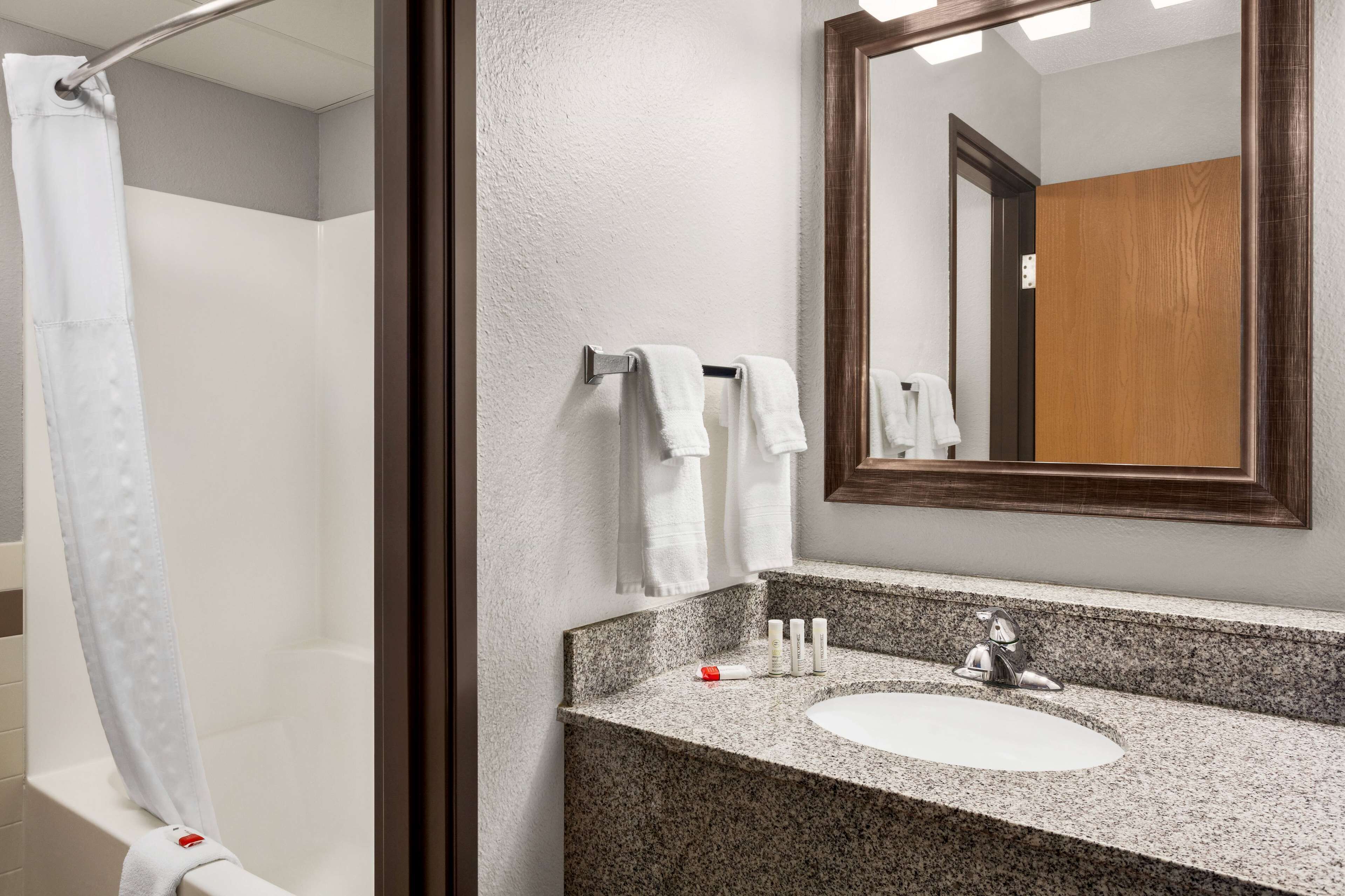 room, 2 queen beds, non smoking | bathroom | free toiletries, hair dryer, bathrobes, towels