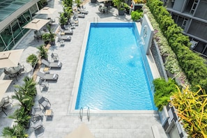 Outdoor pool, open 7:00 AM to 7:00 PM, pool umbrellas, sun loungers