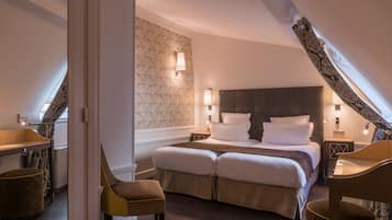 Ropa de cama de alta calidad, colchones con pillow-top y minibar