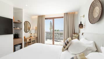 Chambre Deluxe | Literie de qualité supérieure, surmatelas, minibar