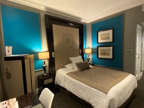 Premium bedding, down comforters, free minibar, in-room safe
