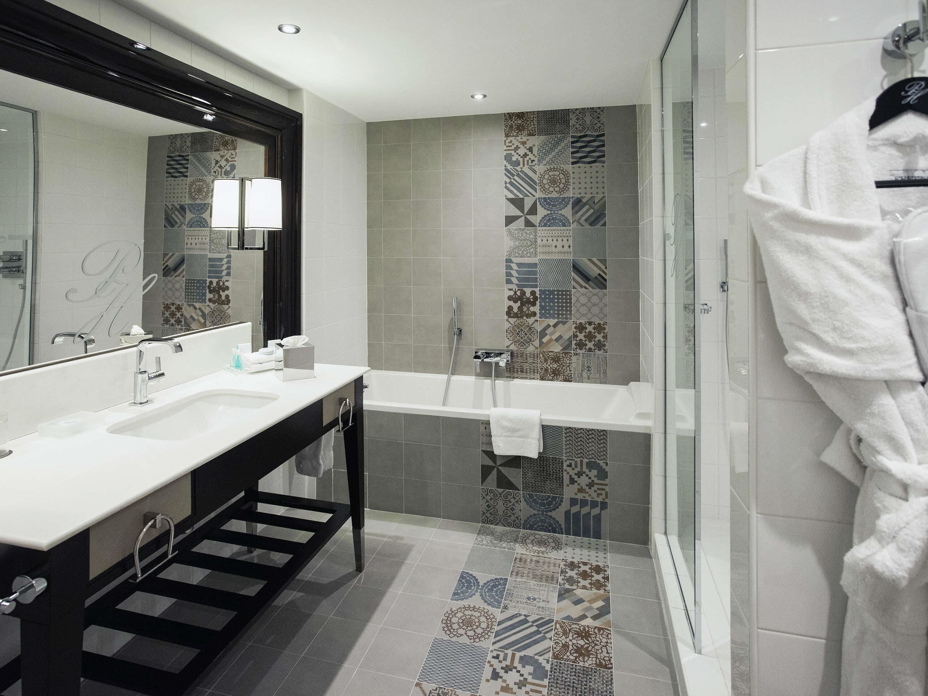Premium bedding, down comforters, free minibar, in-room safe