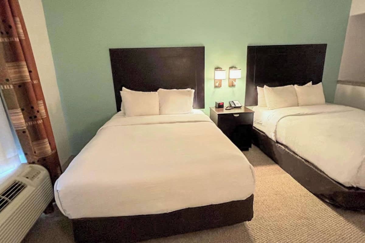 Pillowtop beds, desk, blackout drapes, soundproofing