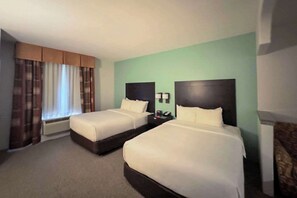 Pillowtop beds, desk, blackout drapes, soundproofing