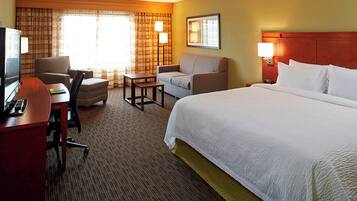 Desk, laptop workspace, blackout drapes, iron/ironing board