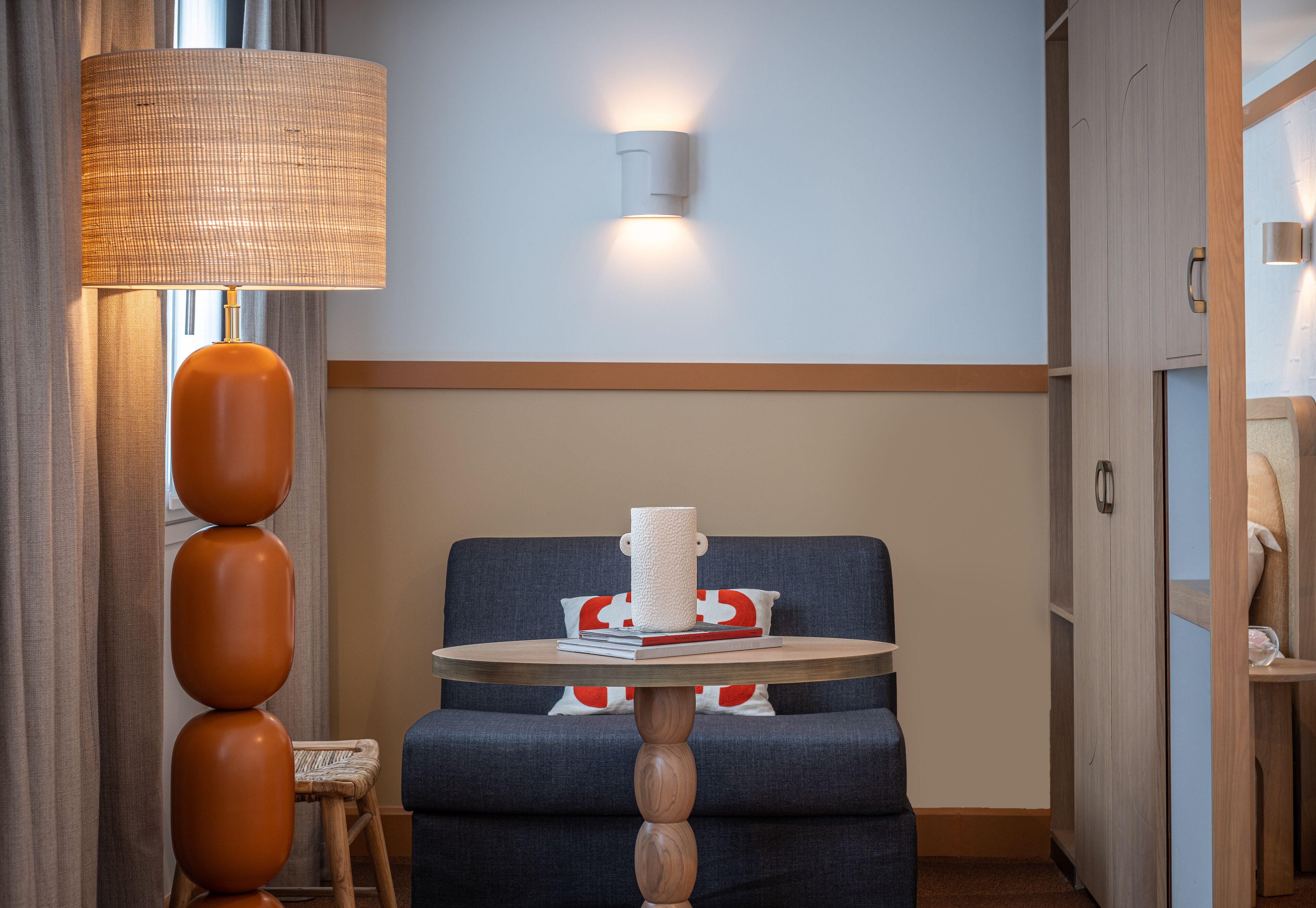 deluxe triple room | living area | flat-screen tv, ipod dock