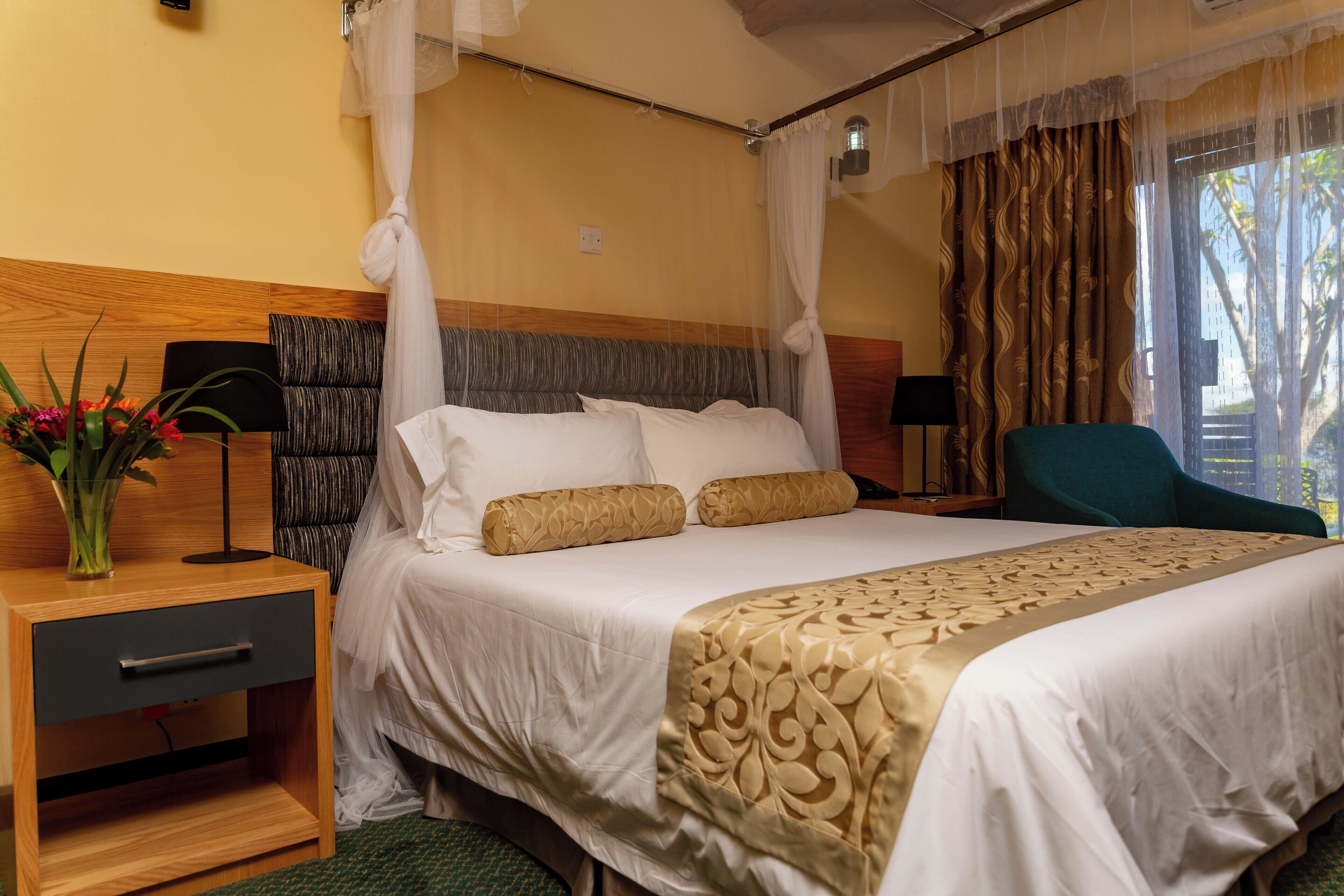 deluxe double room | 1 bedroom, minibar, in-room safe, desk