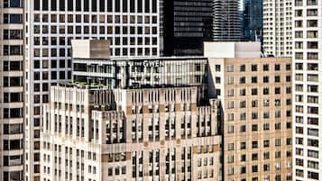 A high-rise building with a modern glass facade and a mix of architectural styles.