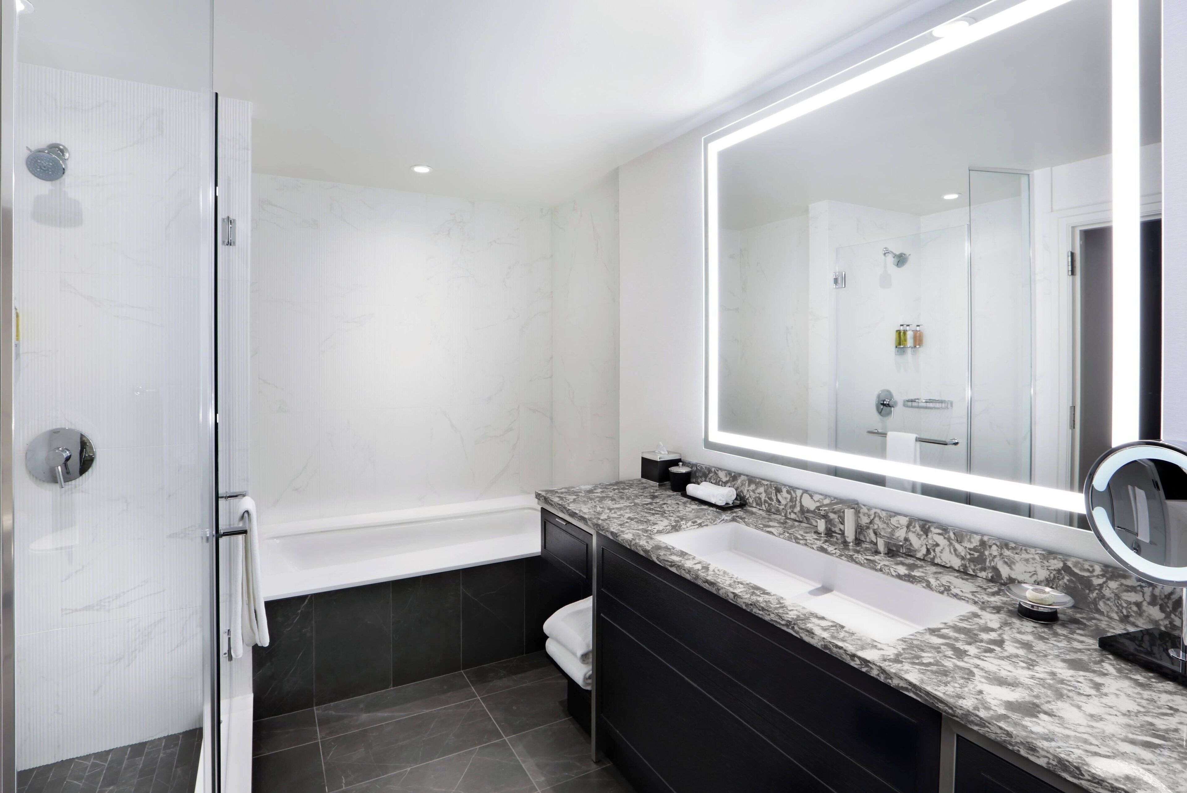 separate bathtub and shower, free toiletries, hair dryer, bathrobes