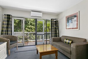 Family Room with Balcony | Living area | 50-inch Smart TV with satellite channels, TV, Netflix