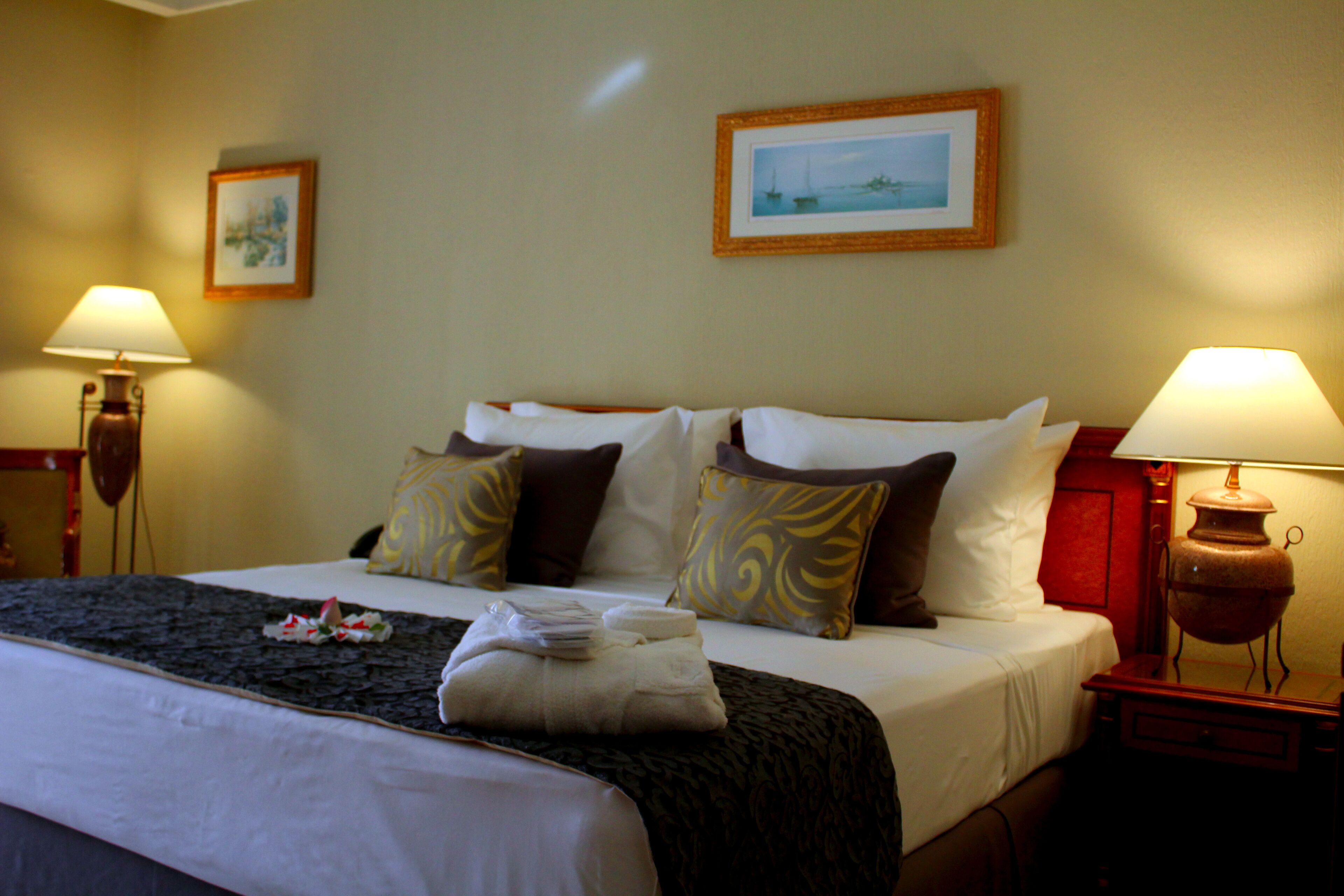 Egyptian cotton sheets, down comforters, Select Comfort beds, minibar