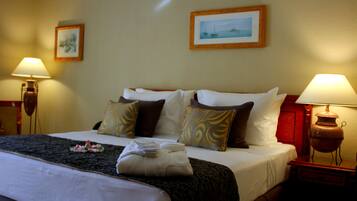Egyptian cotton sheets, down comforters, Select Comfort beds, minibar