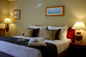 Egyptian cotton sheets, down duvets, Select Comfort beds, minibar