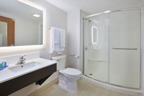 Suite, 1 King Bed | Bathroom | Hair dryer, towels