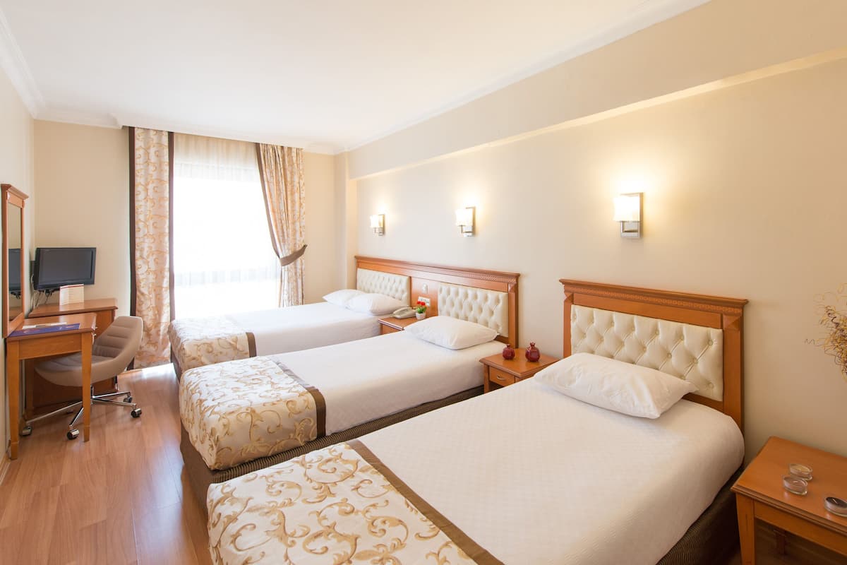 Standard Triple Room | Frette Italian sheets, premium bedding, Select Comfort beds, minibar