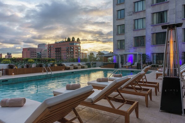 2 outdoor pools, sun loungers